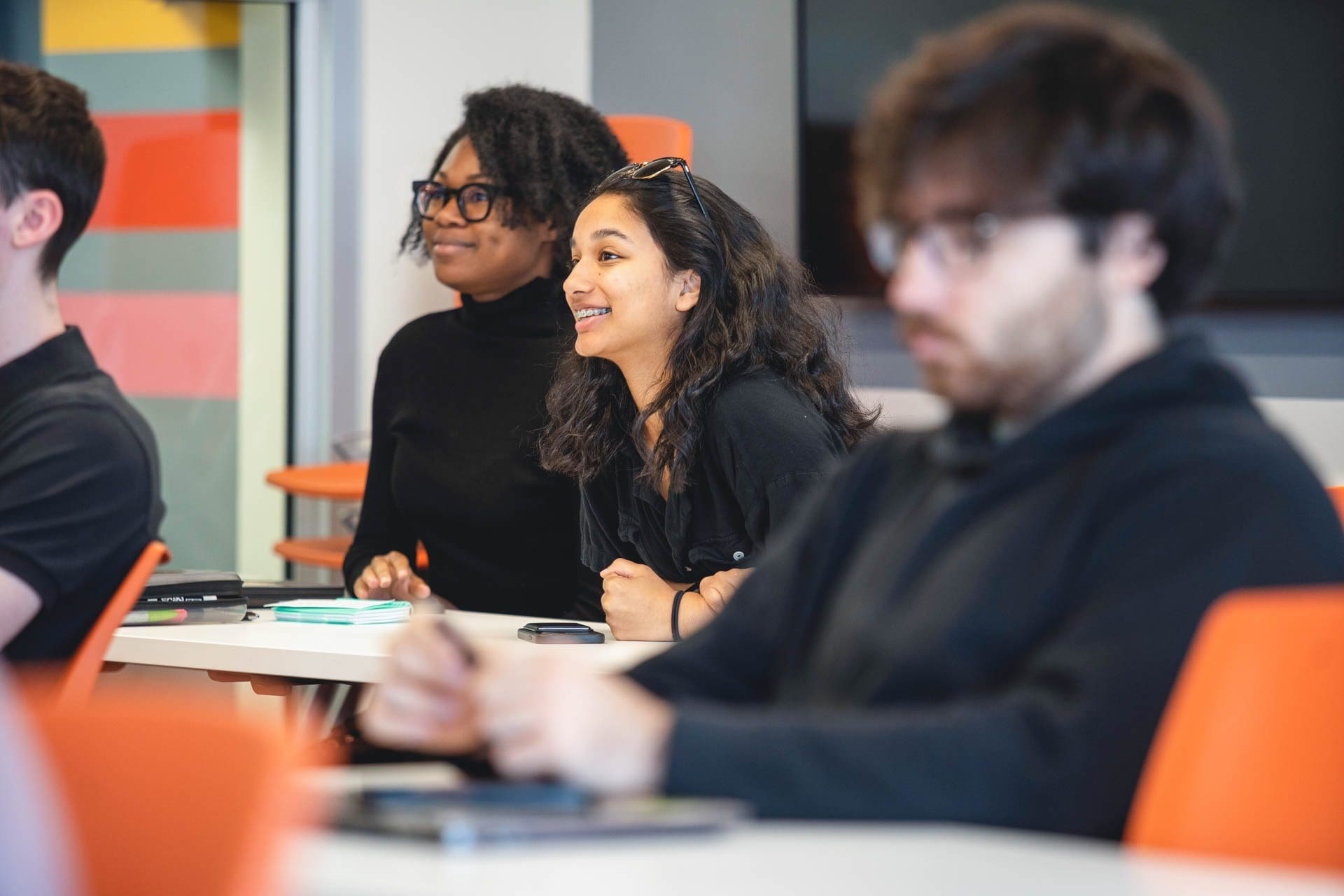 two young women in class